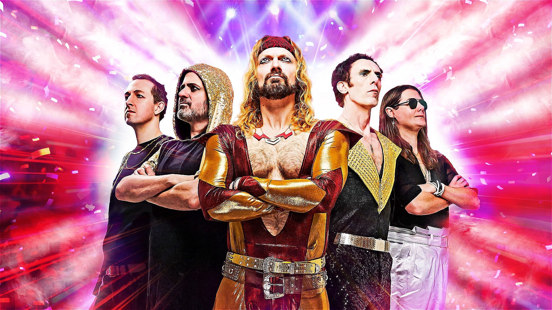 A band of 5 spandex-clad rockstars stand against a backdrop of brightly coloured stadium lights and smoke