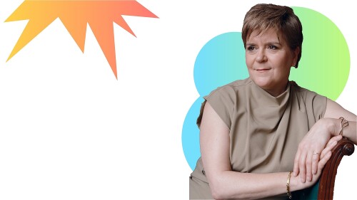 Nicola Sturgeon in the right hand corner of the screen is sat down looking outward. 