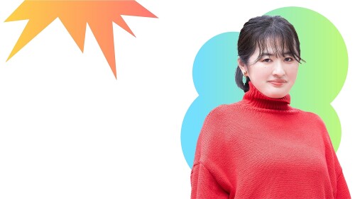 Photo of Asako Yuzuki in the irght hand corner she wears a red knitted jumper 