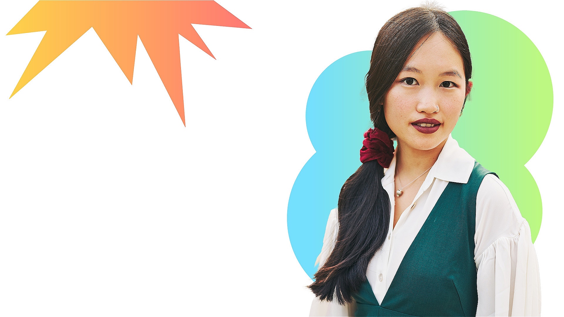 Headshot of author R F Kuang she is weating a white shirt with a green top layered over the top 