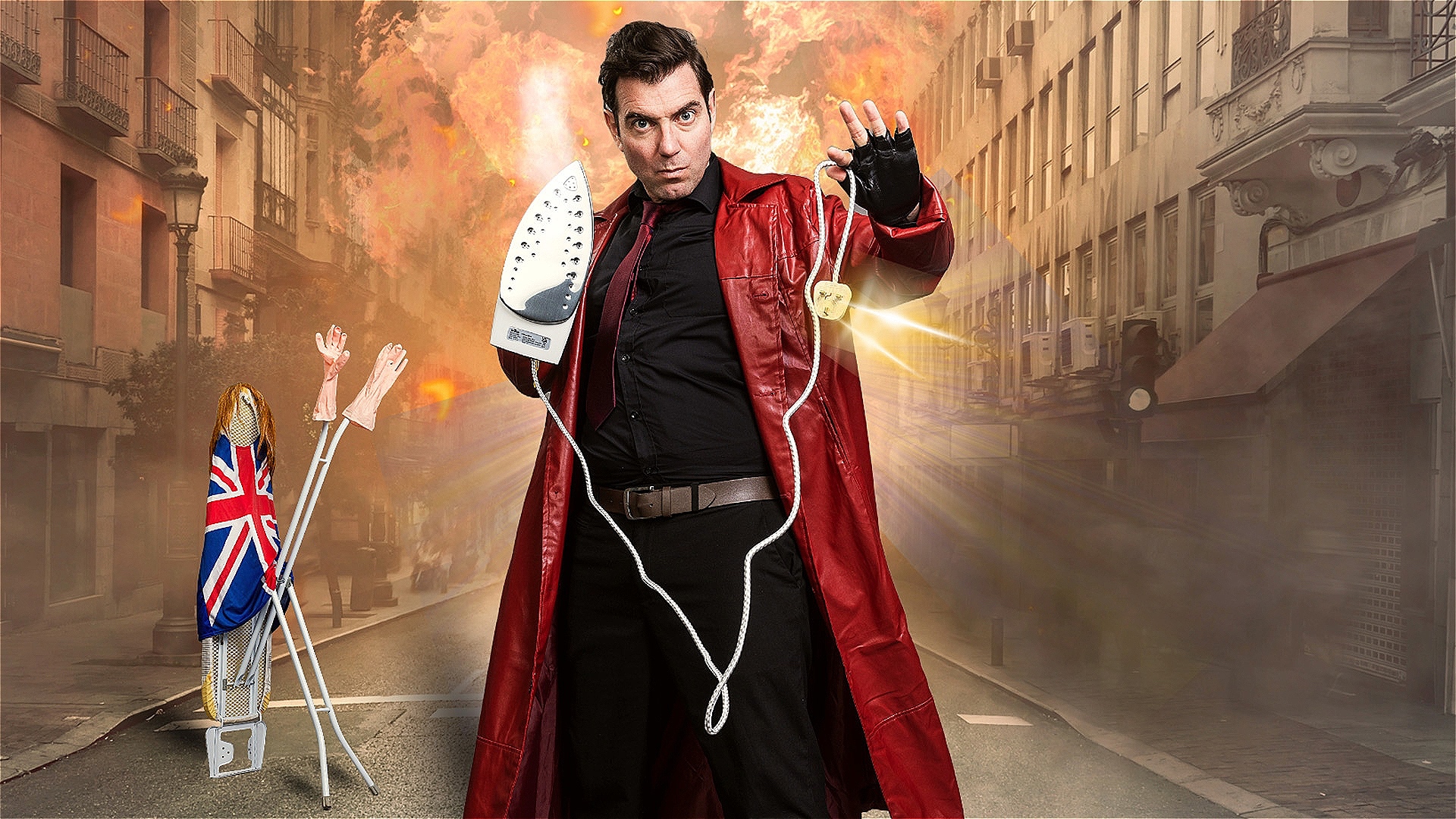 A man dressing in a red coat holding an iron 