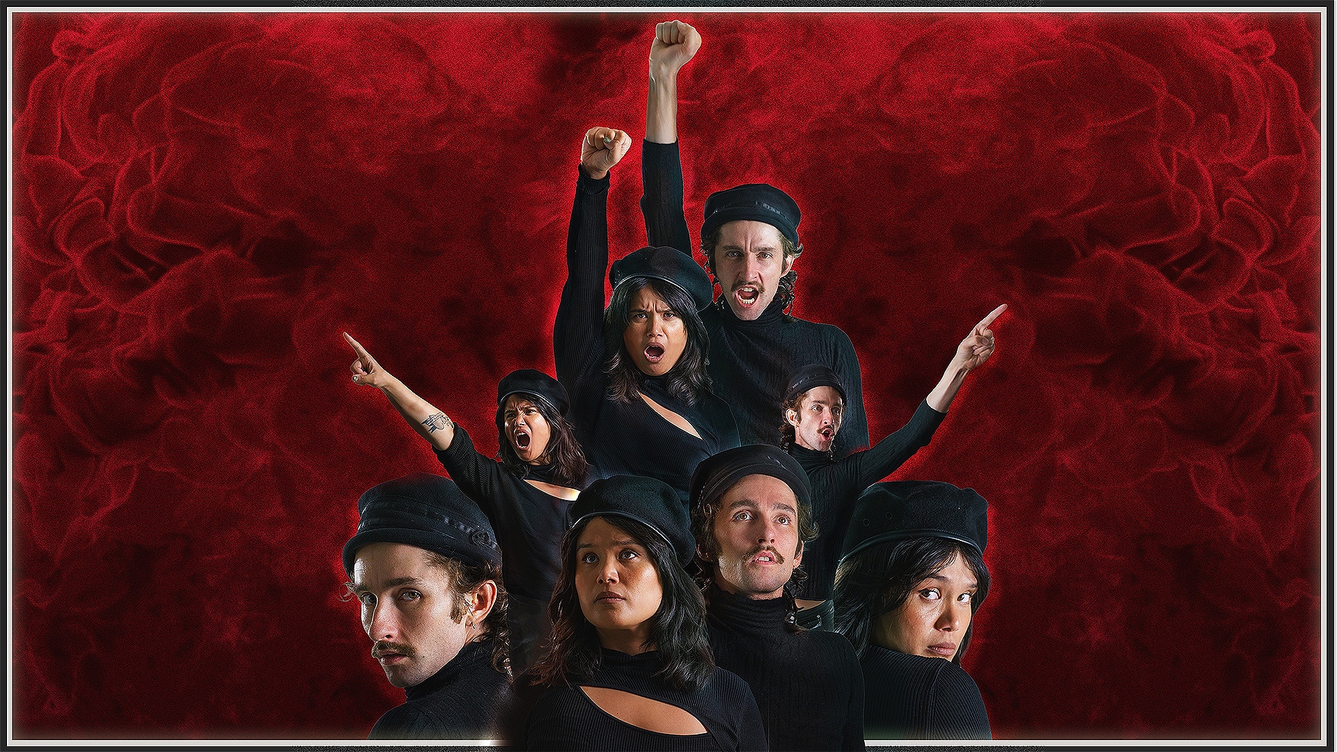 Ethan & Gigi strike many different poses against a red fiery background. They look really cool.