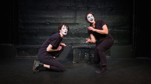 Two mimes miming skipping stones.