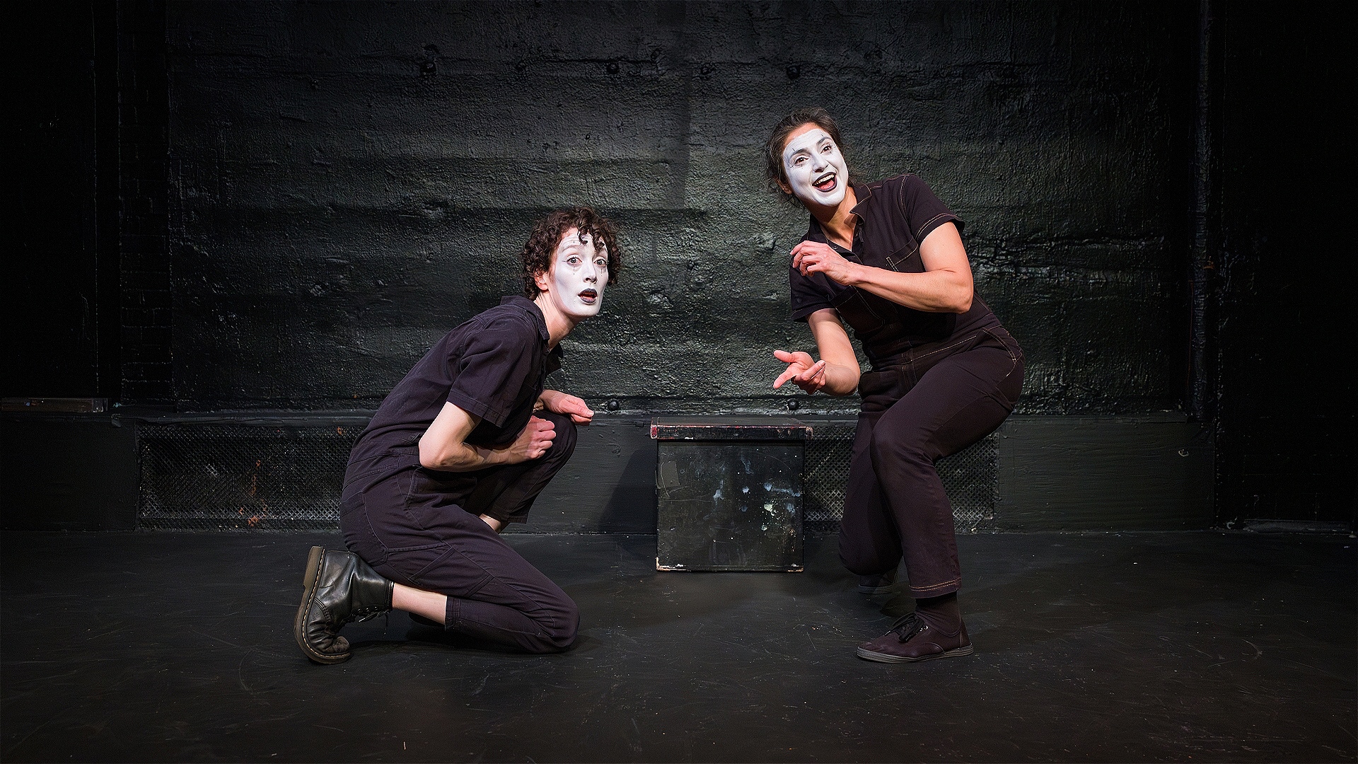 Two mimes miming skipping stones.