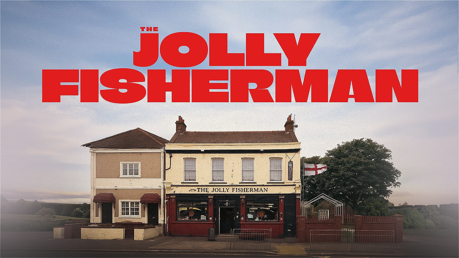 A pub called The Jolly Fisherman centre screen. An English Flag flying in the breeze. The pub surrounded by a picturesque England.