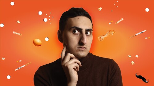 A headshot of Aarian Mehrabani on an angle coming in from the bottom left Corner.  Aarian is a clean shaven Middle Eastern man in his 20s with thick black hair and a wide white smile.  The background is a bright orange.