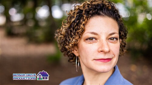 A headshot of the artist, Marisol Soledad, with Benson Drive Productions' logo in the corner.