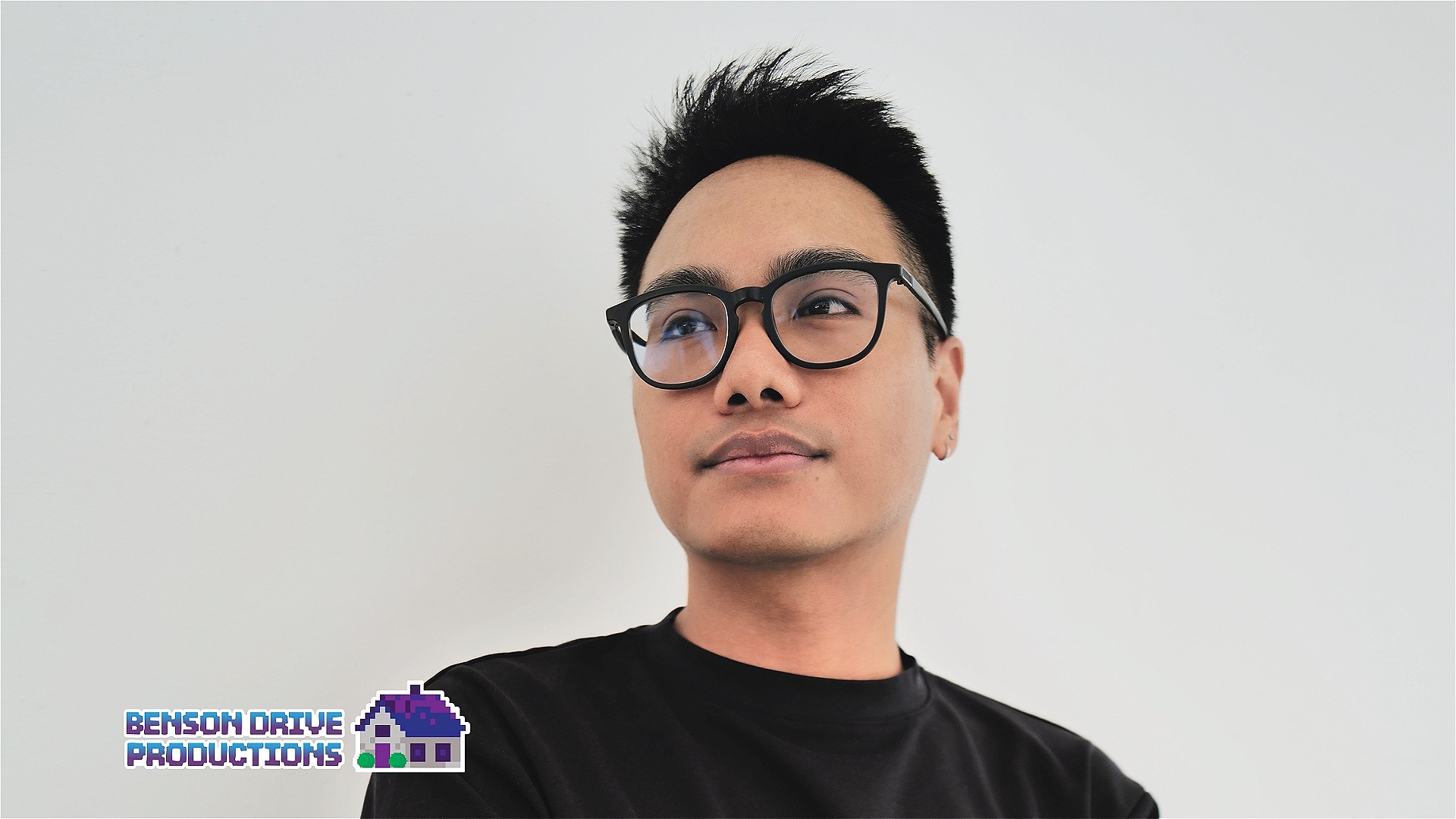 A headshot of the artist, Nicholas Pilapil, with Benson Drive Productions' logo in the corner.
